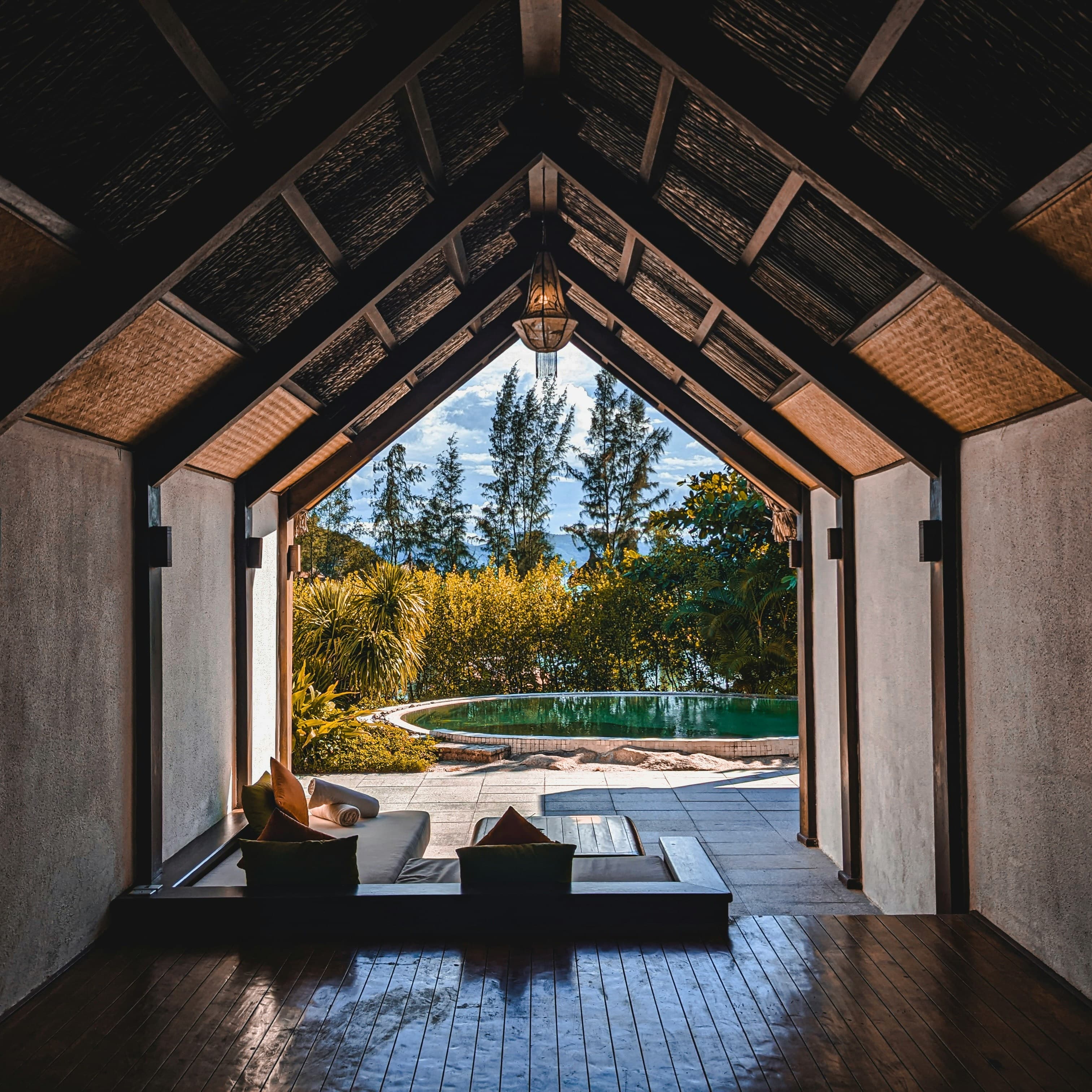 Spacious wellness retreat space with natural light and meditation area